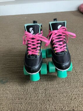 Kids Black Roller Skates with Pink Laces and Green Wheels